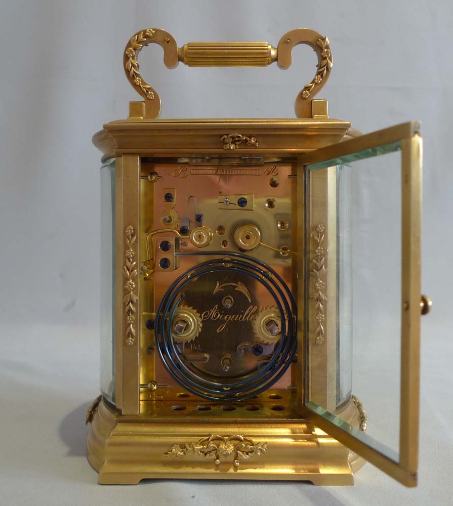 Good French carriage clock with blue enamel dial and strike and alarm function.