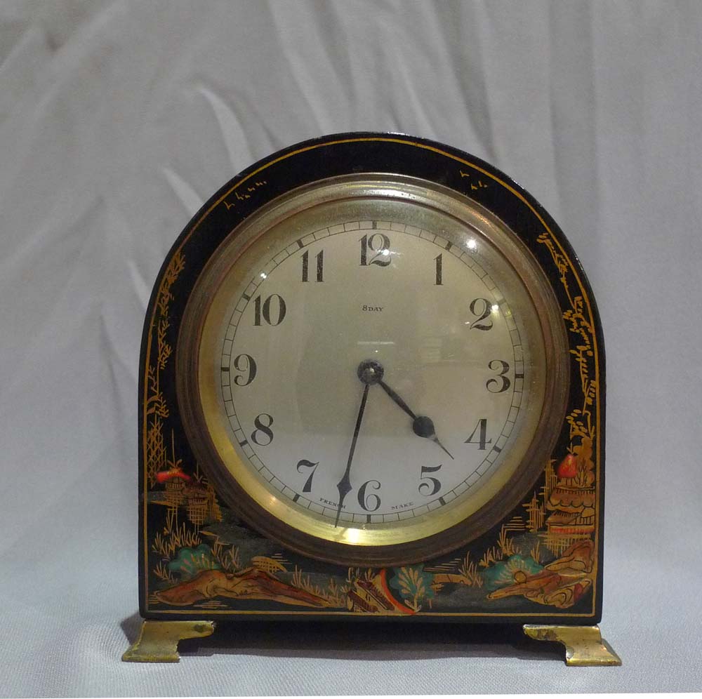 Dome topped black lacquer and chinnoisserie decorated mante clock
