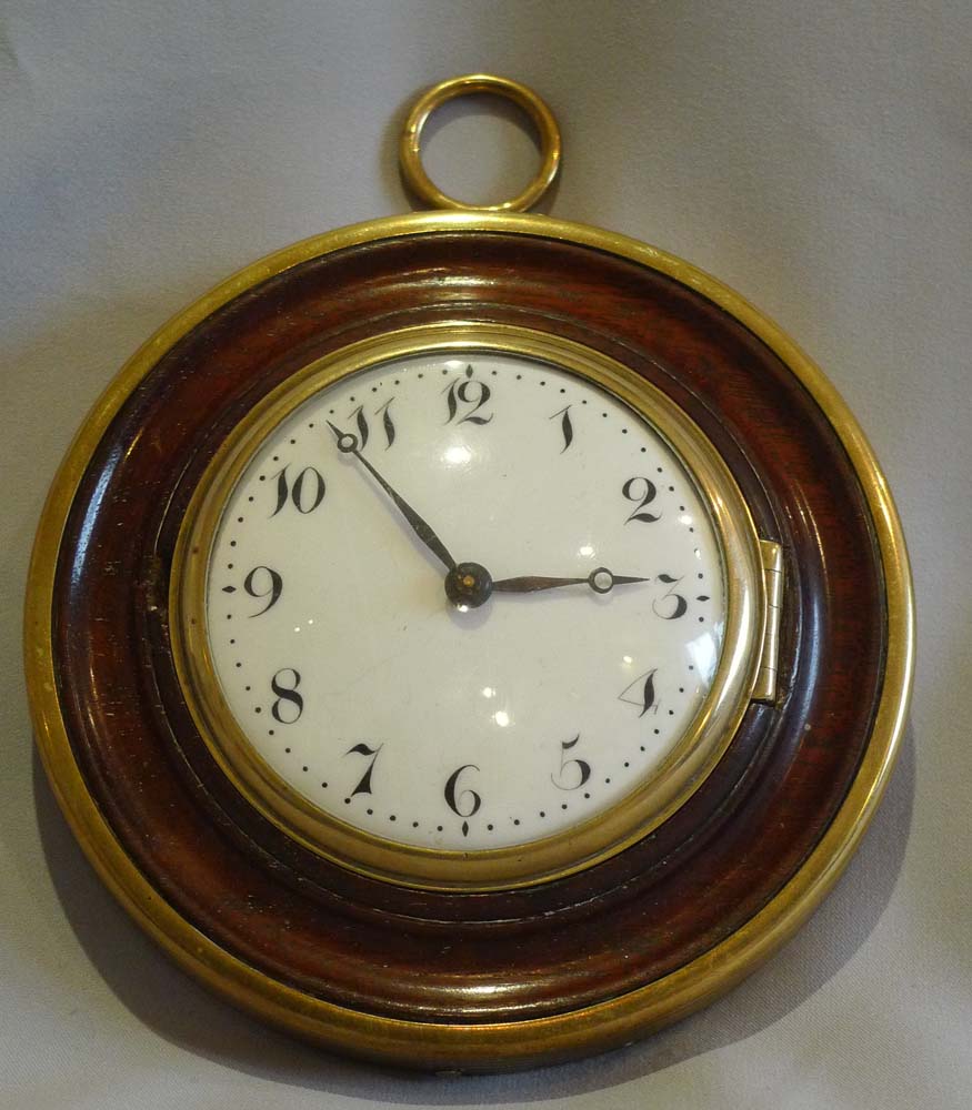 Antique late 18th century Sedan clock in mahogany and brass with later 8 day movement.