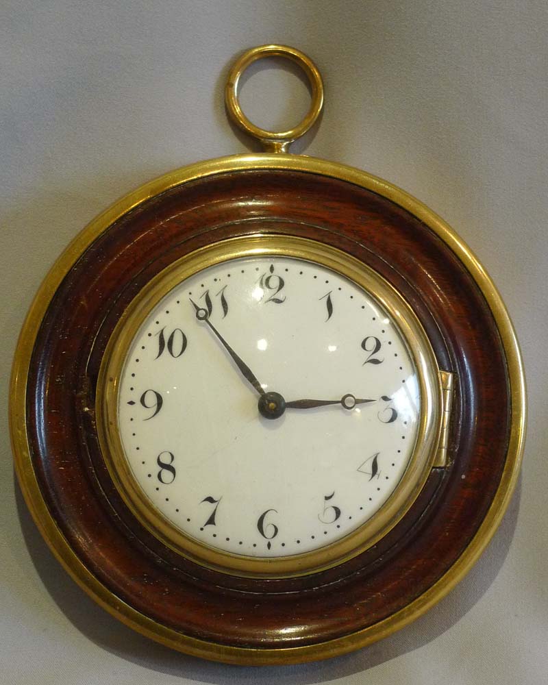 Antique late 18th century Sedan clock in mahogany and brass with later 8 day movement.