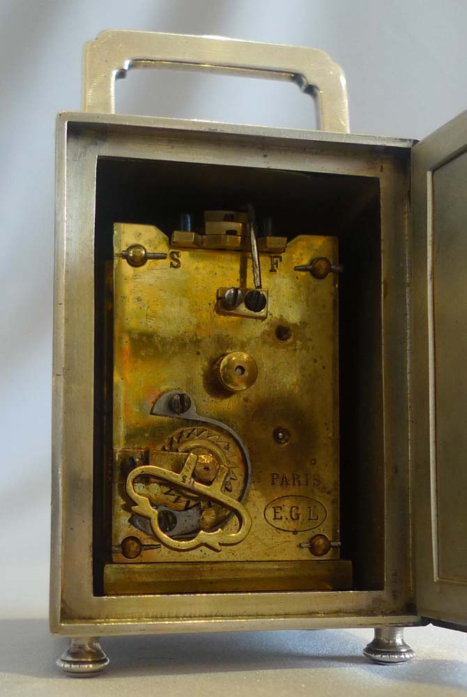 Antique silver and foil backed glass carraige clock by Thornhill & Co