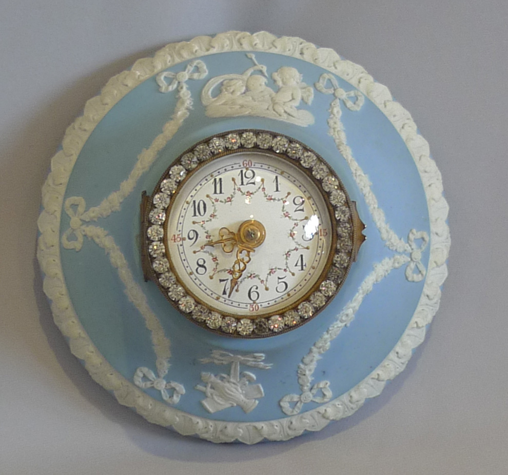 Antique Wedgwood wall clock with brilliants.