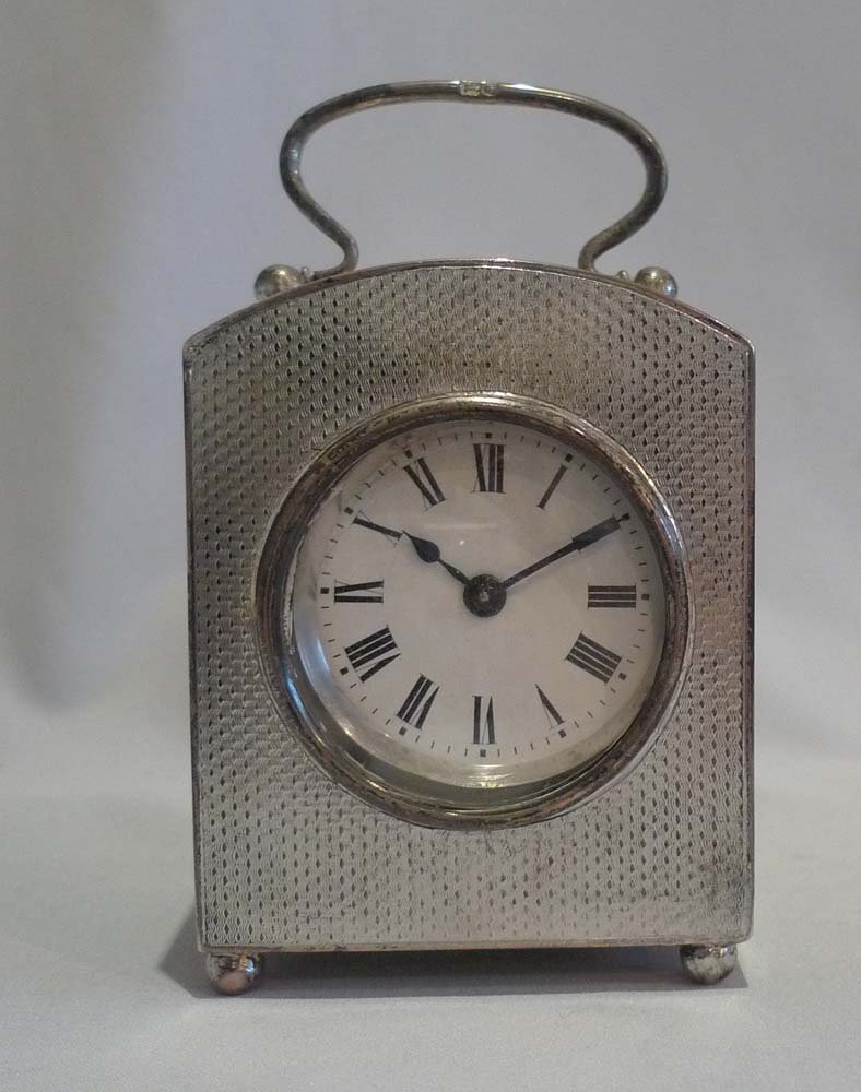 Antique Edwardian silver engine turned case carriage timepiece.