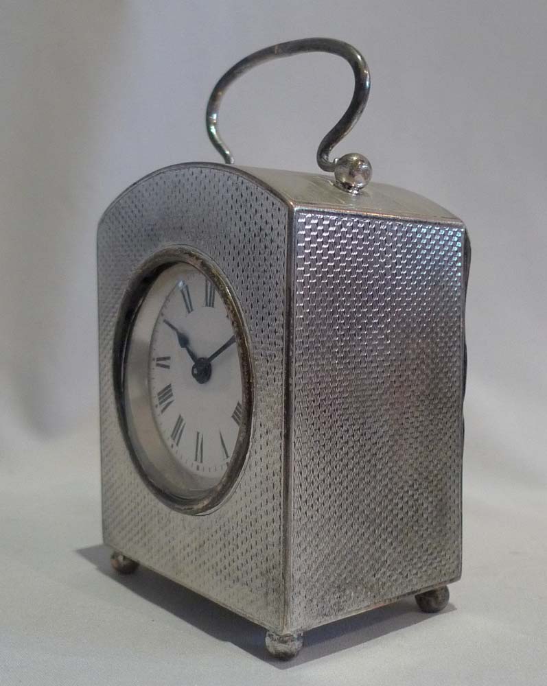 Antique Edwardian silver engine turned case carriage timepiece.