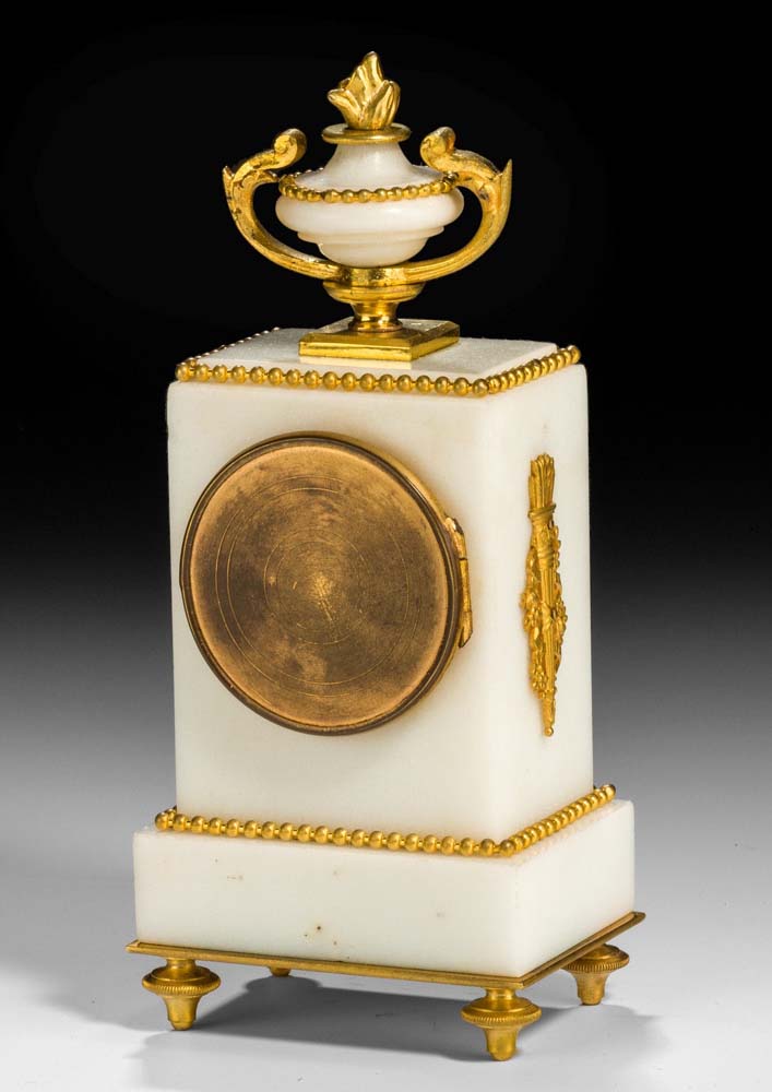 Antique French small mantel clock in Louis XVIth style, white arble and gilt bronze mounted