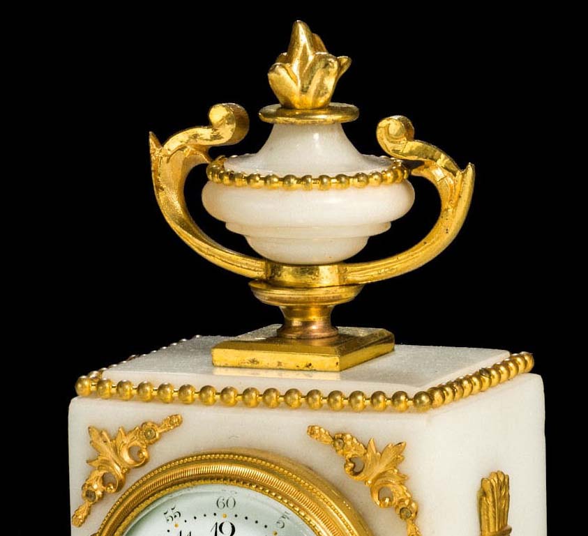 Antique French small mantel clock in Louis XVIth style, white arble and gilt bronze mounted