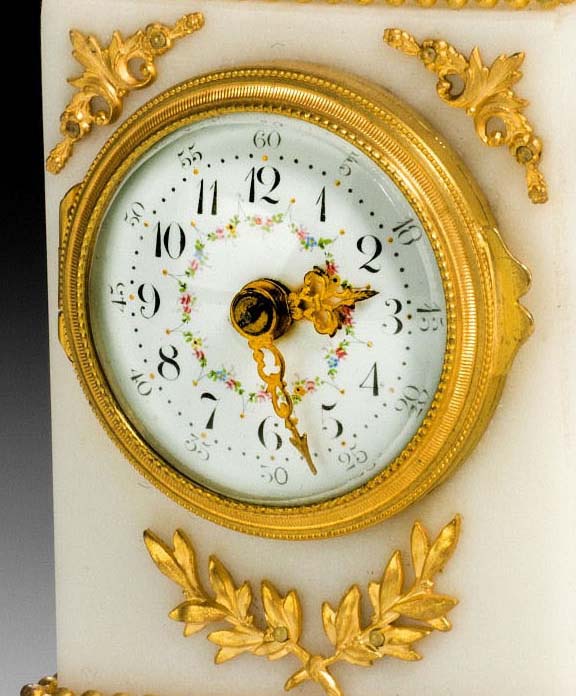 Antique French small mantel clock in Louis XVIth style, white arble and gilt bronze mounted