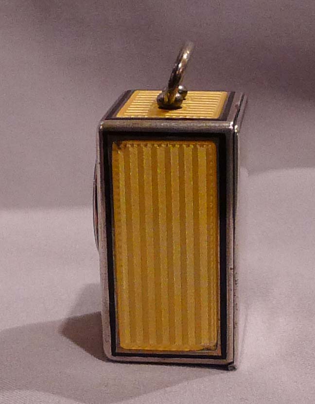 Silver and Imperial yellow guilloche enamel sub-miniature carriage or boudoire clock.