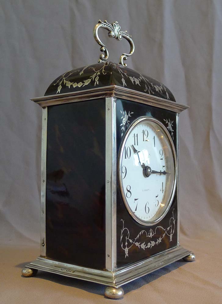 Antique silver and tortoiseshell pique large striking mantel clock signed Asprey.