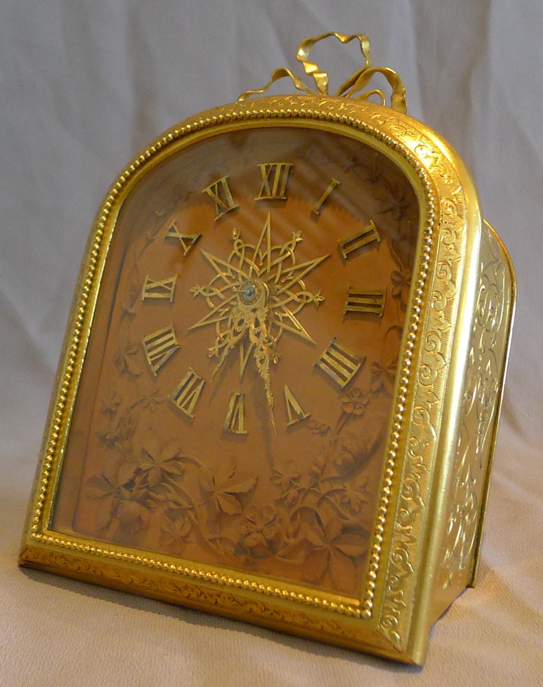 English ormolu mantel clock in manner of Cole by Barry of London with signed carved limewood dial.