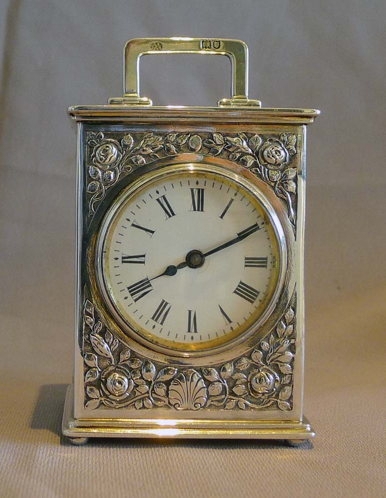 Antique English Edwardian solid silver carriage clock.