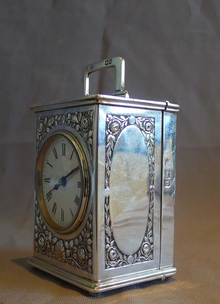 Antique English Edwardian solid silver carriage clock.