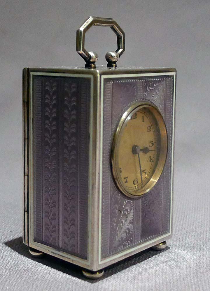 Swiss lilac guilloche enamel and silver sub miniature carriage clock in original travelling case.