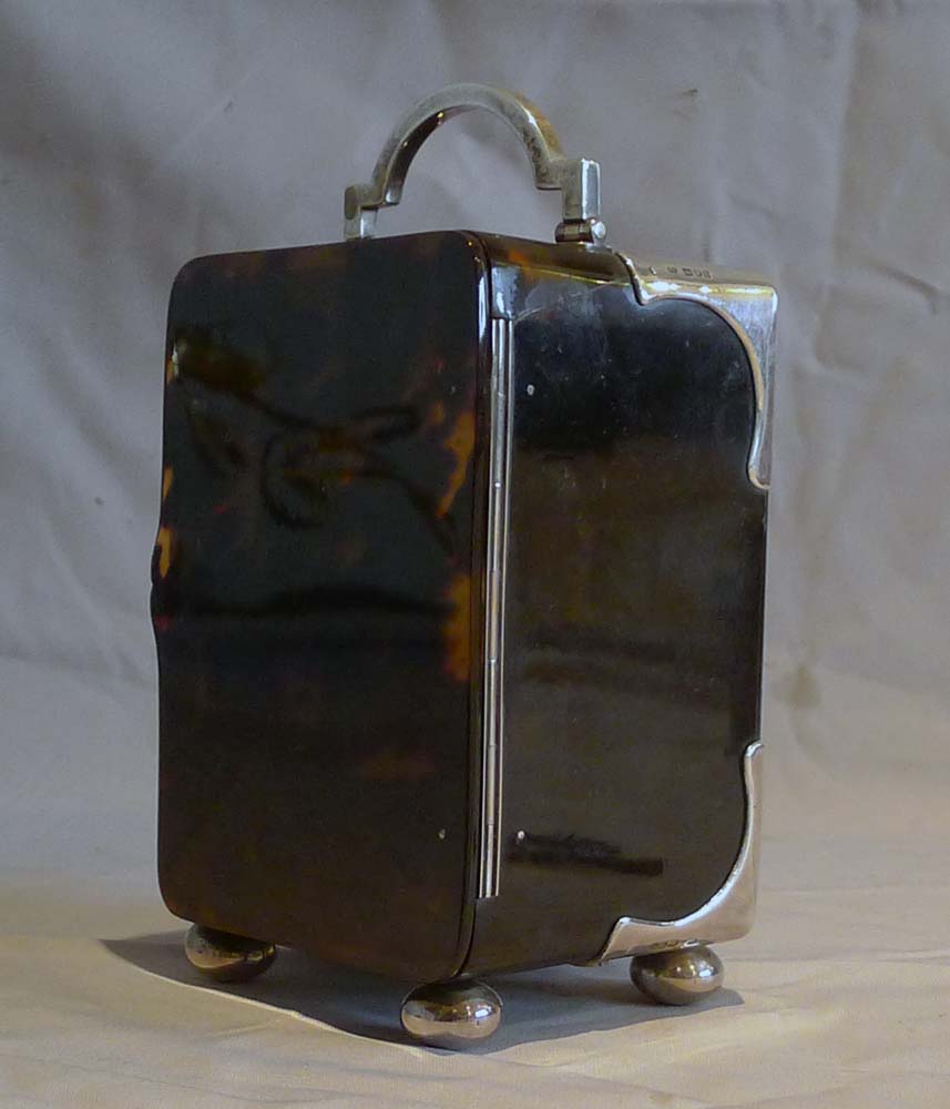 Antique silver mounted tortoiseshell carriage clock with strike and repeat