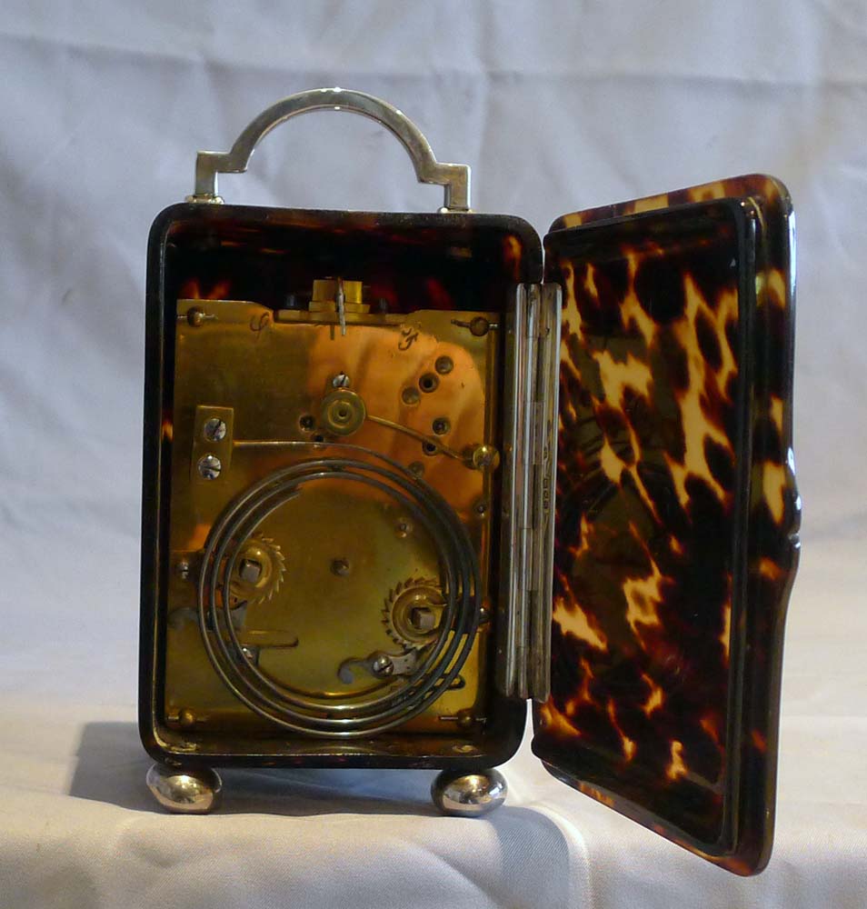 Antique silver mounted tortoiseshell carriage clock with strike and repeat