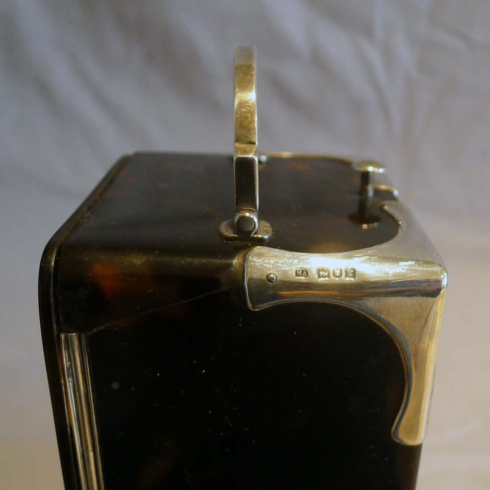 Antique silver mounted tortoiseshell carriage clock with strike and repeat