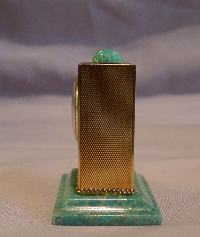 Sub miniature, cased, solid 14 carat gold jade mounted carriage clock by Geneva Clock Company.