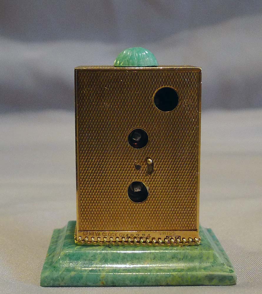 Sub miniature, cased, solid 14 carat gold jade mounted carriage clock by Geneva Clock Company.