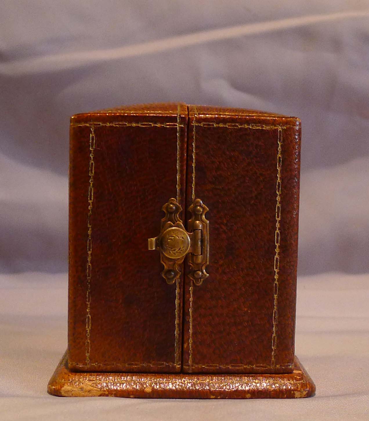 Sub miniature, cased, solid 14 carat gold jade mounted carriage clock by Geneva Clock Company.