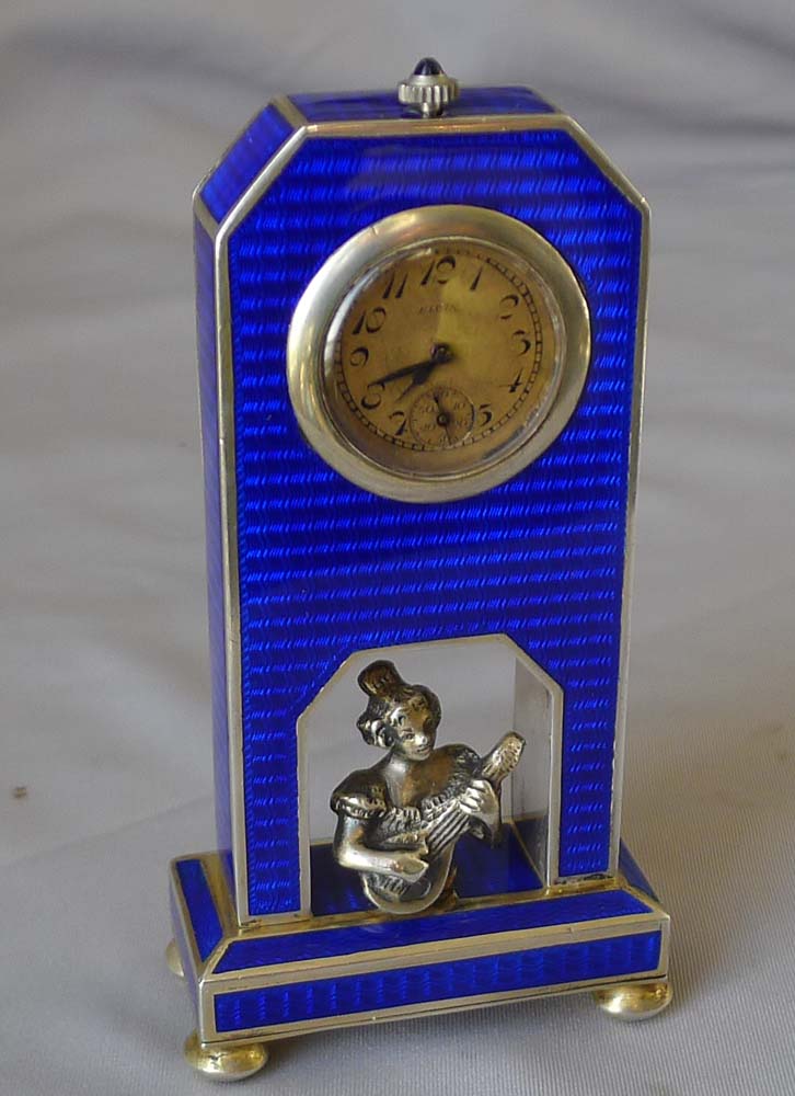 Antique silver and blue guilloche enamel miniature clock with silver bust.