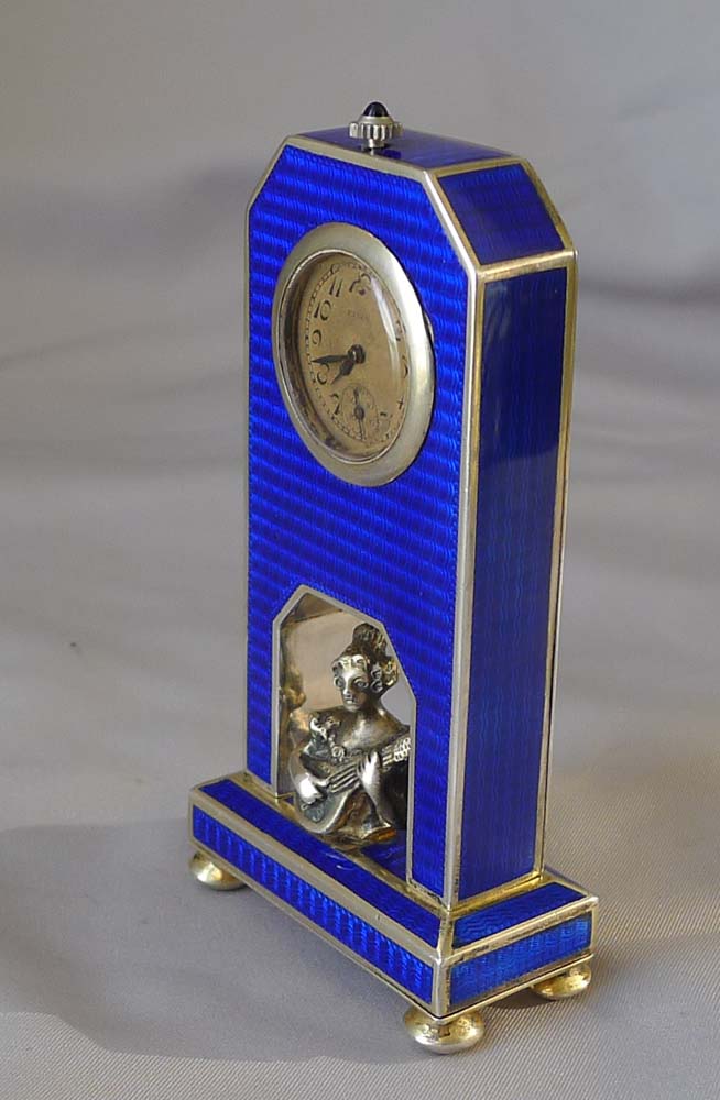 Antique silver and blue guilloche enamel miniature clock with silver bust.