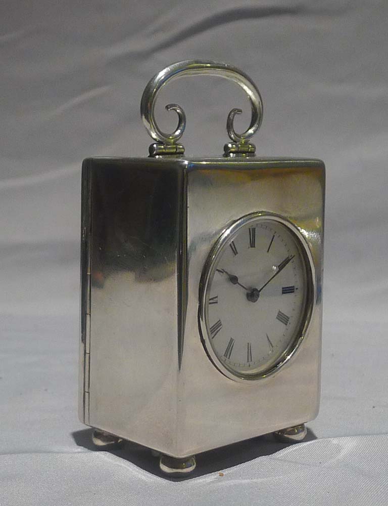 Antique English silver miniature carriage clock hallmarked for London 1903.