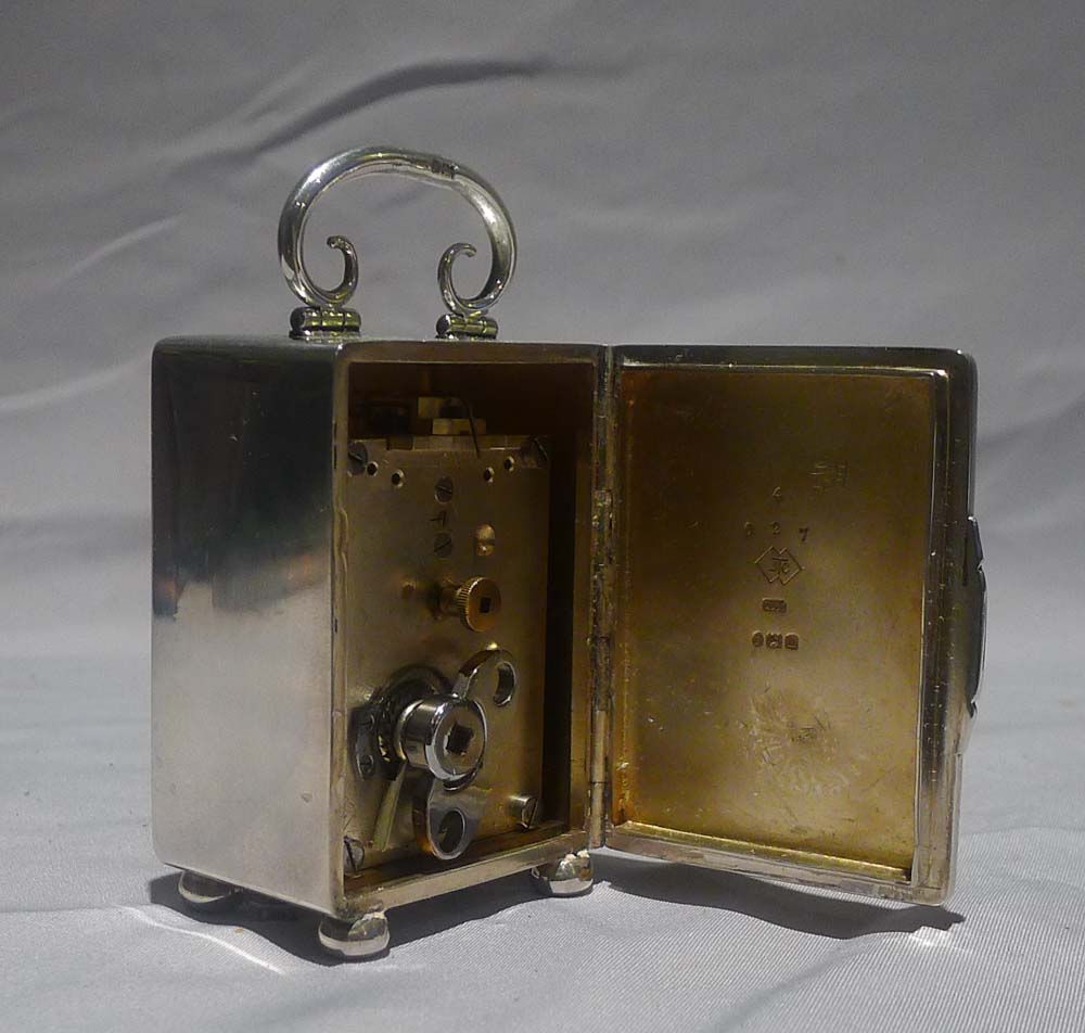 Antique English silver miniature carriage clock hallmarked for London 1903.