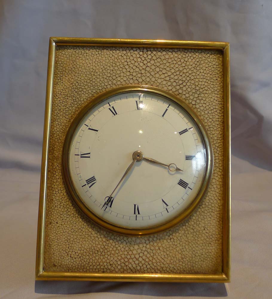 A fine antique English Edwardian shagreen and gilt bronze strut clock.