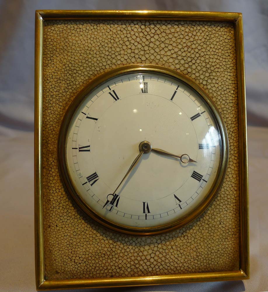 A fine antique English Edwardian shagreen and gilt bronze strut clock.