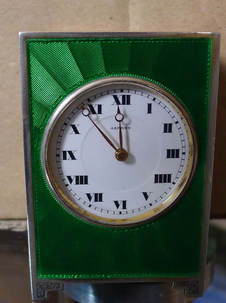Aspreys green guilloche enamel and silver boudoire clock.