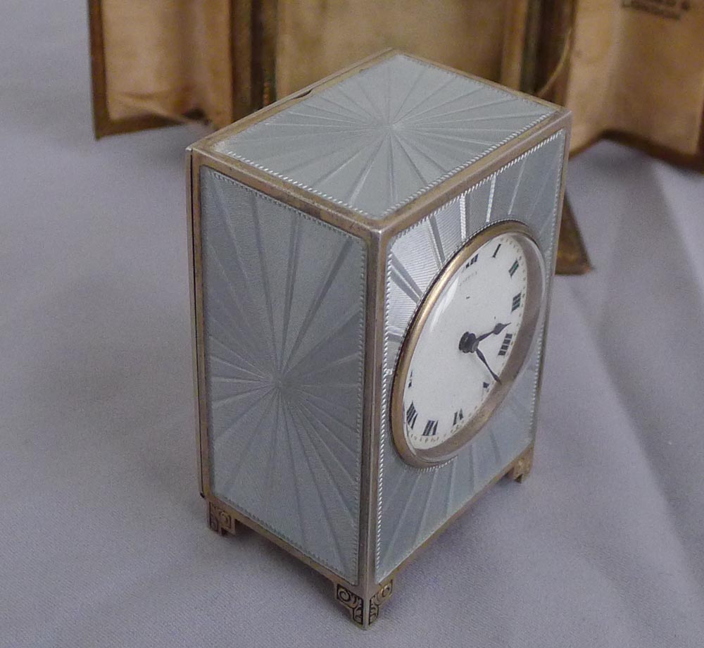A fine, cased Aspreys Swiss silver and guilloche enamel miniature boudoir clock.
