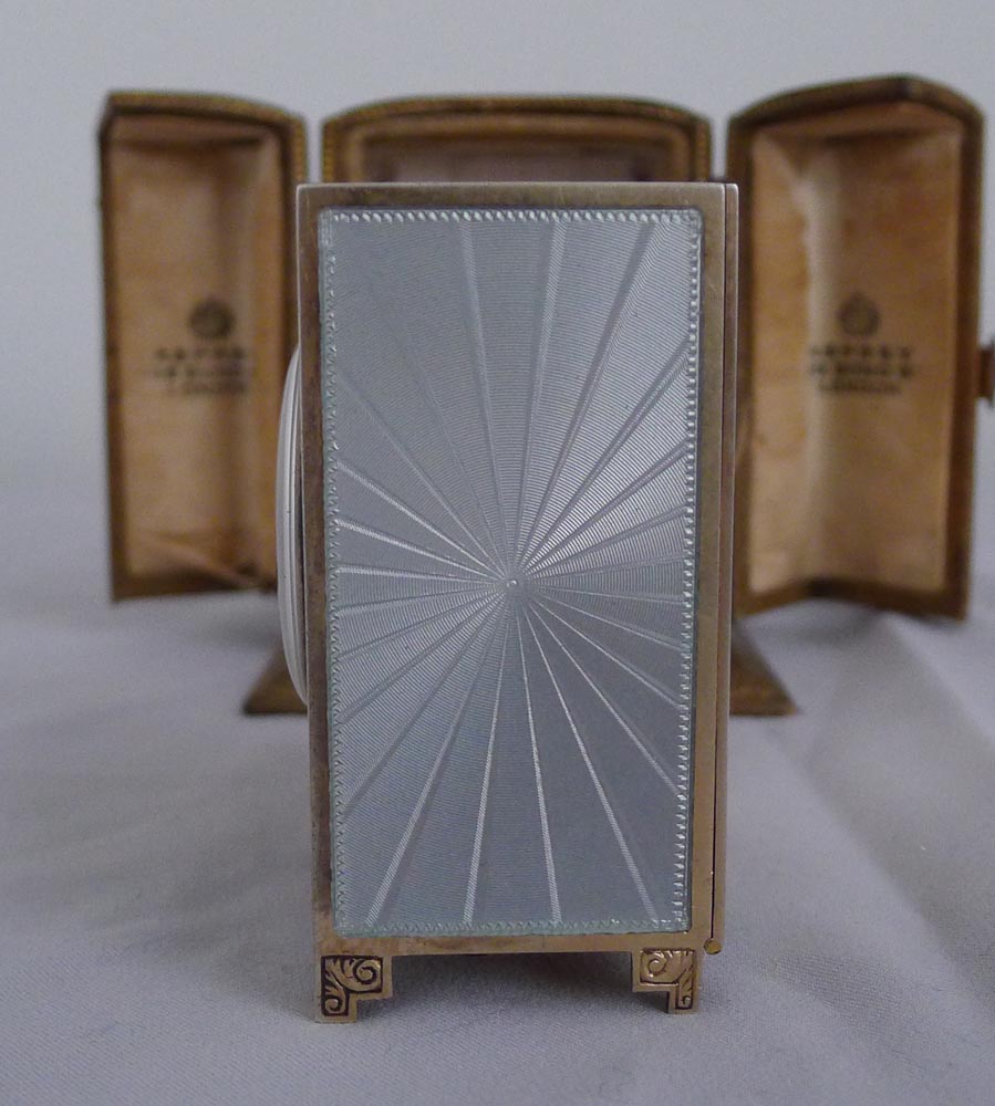 A fine, cased Aspreys Swiss silver and guilloche enamel miniature boudoir clock.