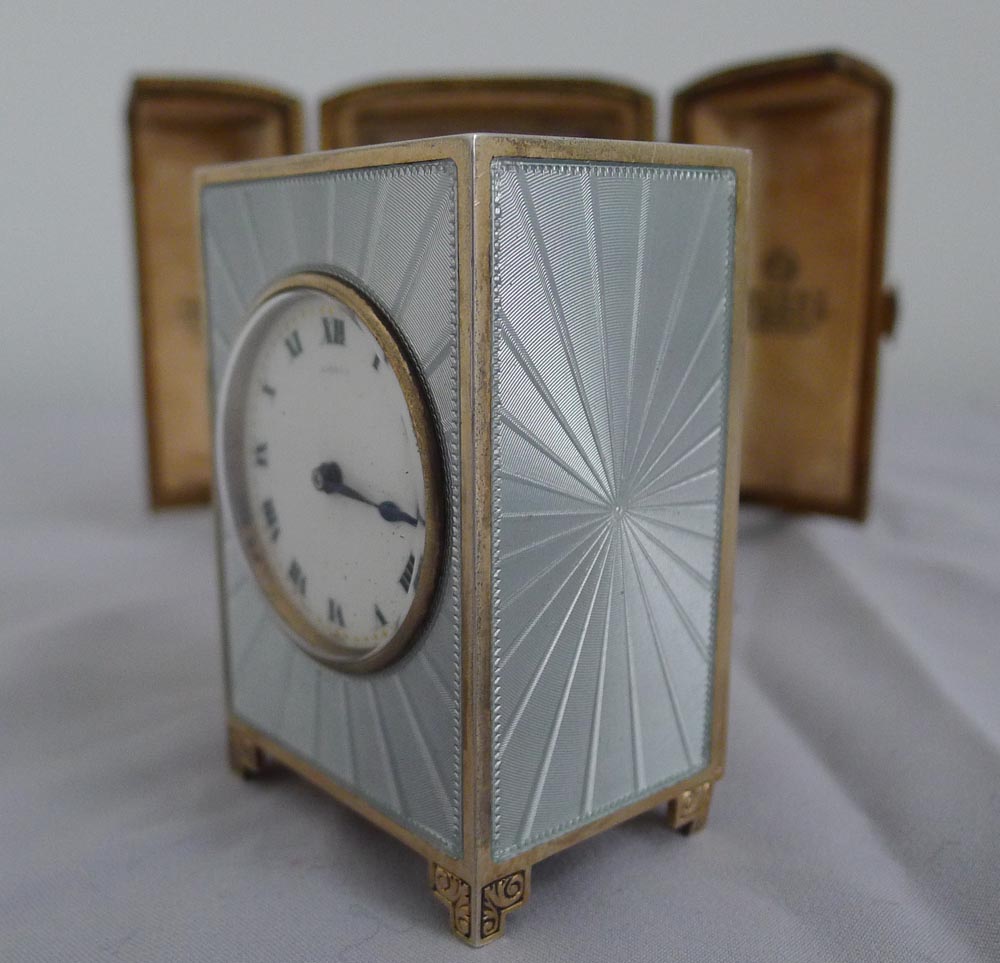 A fine, cased Aspreys Swiss silver and guilloche enamel miniature boudoir clock.