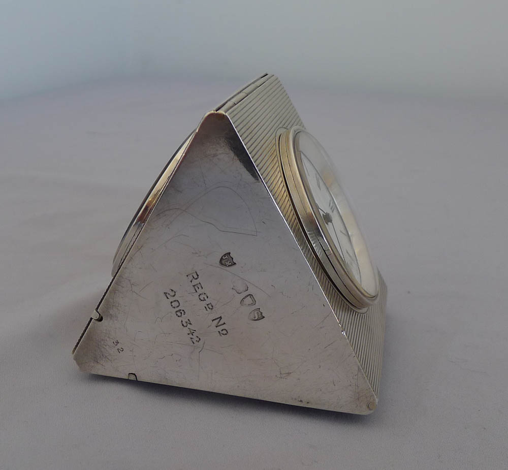 Antique silver multi dial desk clock with rare triangular case