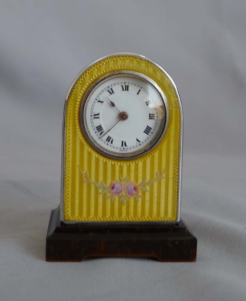 Fine silver, guilloche and hand painted enamel, cased sub-miniature clock with Tiger's Eye base.