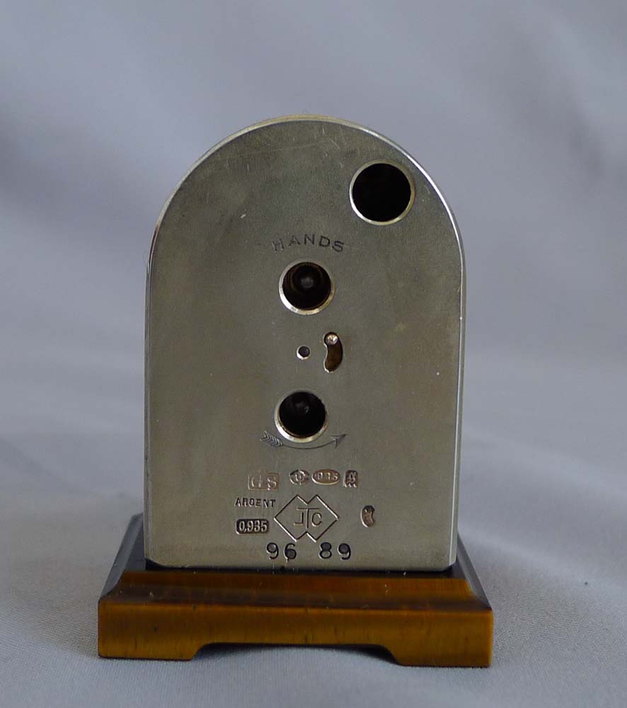 Fine silver, guilloche and hand painted enamel, cased sub-miniature clock with Tiger's Eye base.