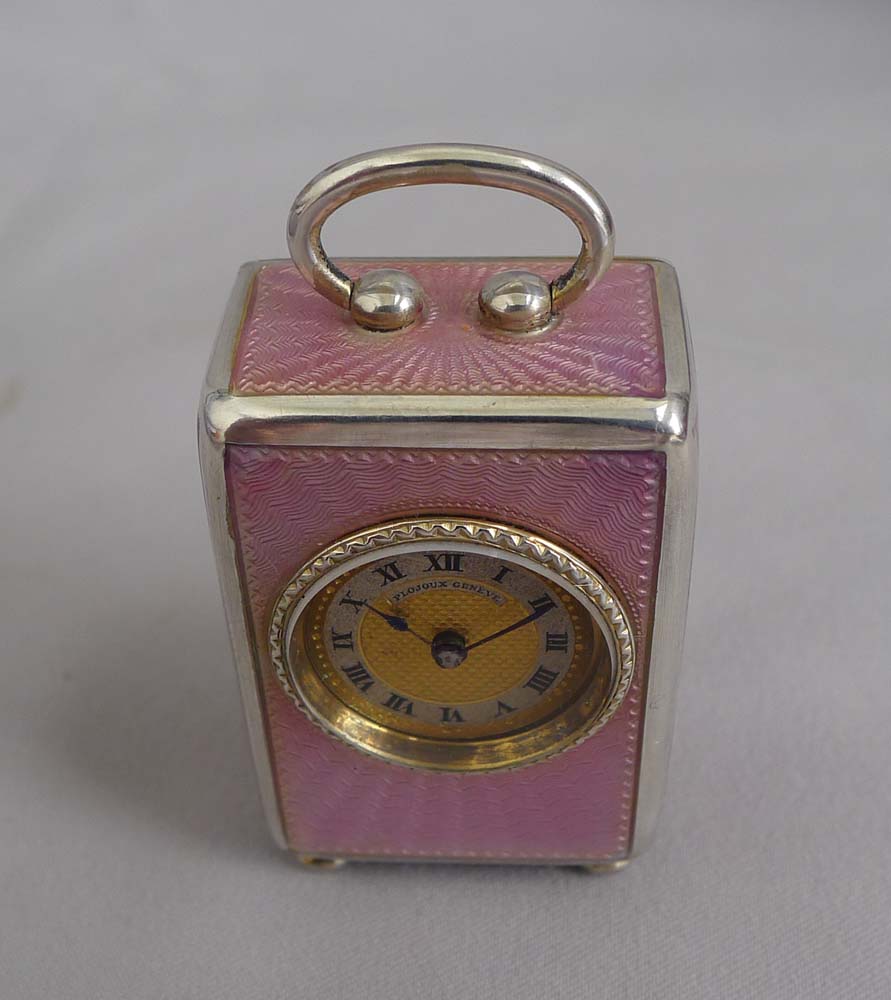 Pink guilloche enamel and silver gilt sub-miniature carriage or boudoir clock, original case and key