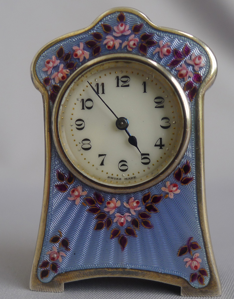 Silver and enamel boudoir clock in original leather fitted case