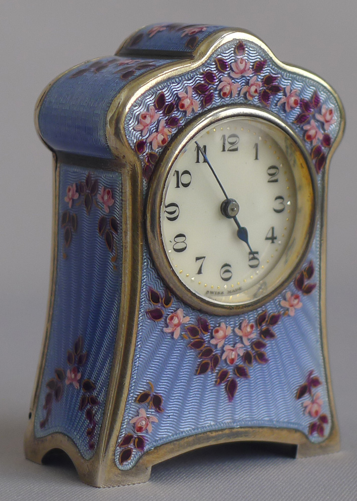 Silver and enamel boudoir clock in original leather fitted case