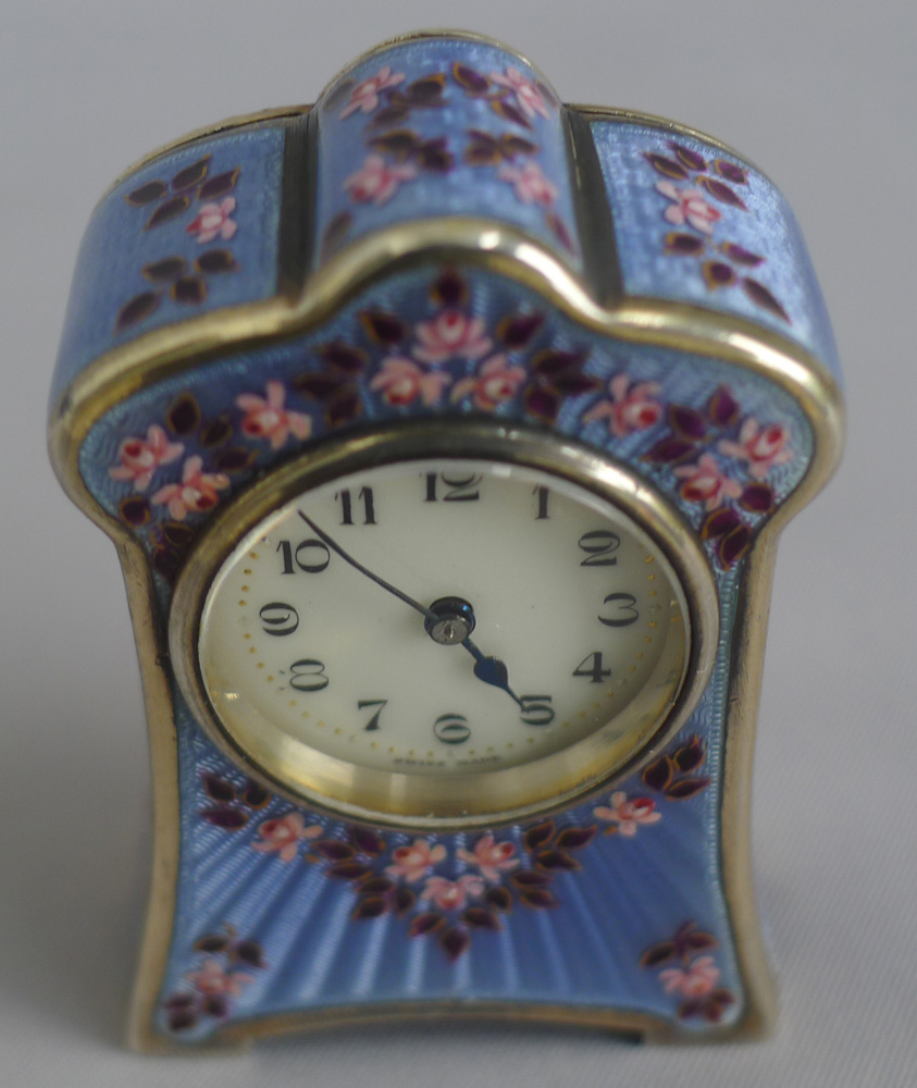 Silver and enamel boudoir clock in original leather fitted case