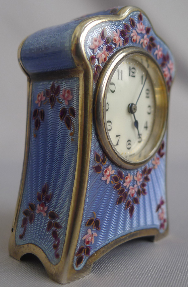 Silver and enamel boudoir clock in original leather fitted case