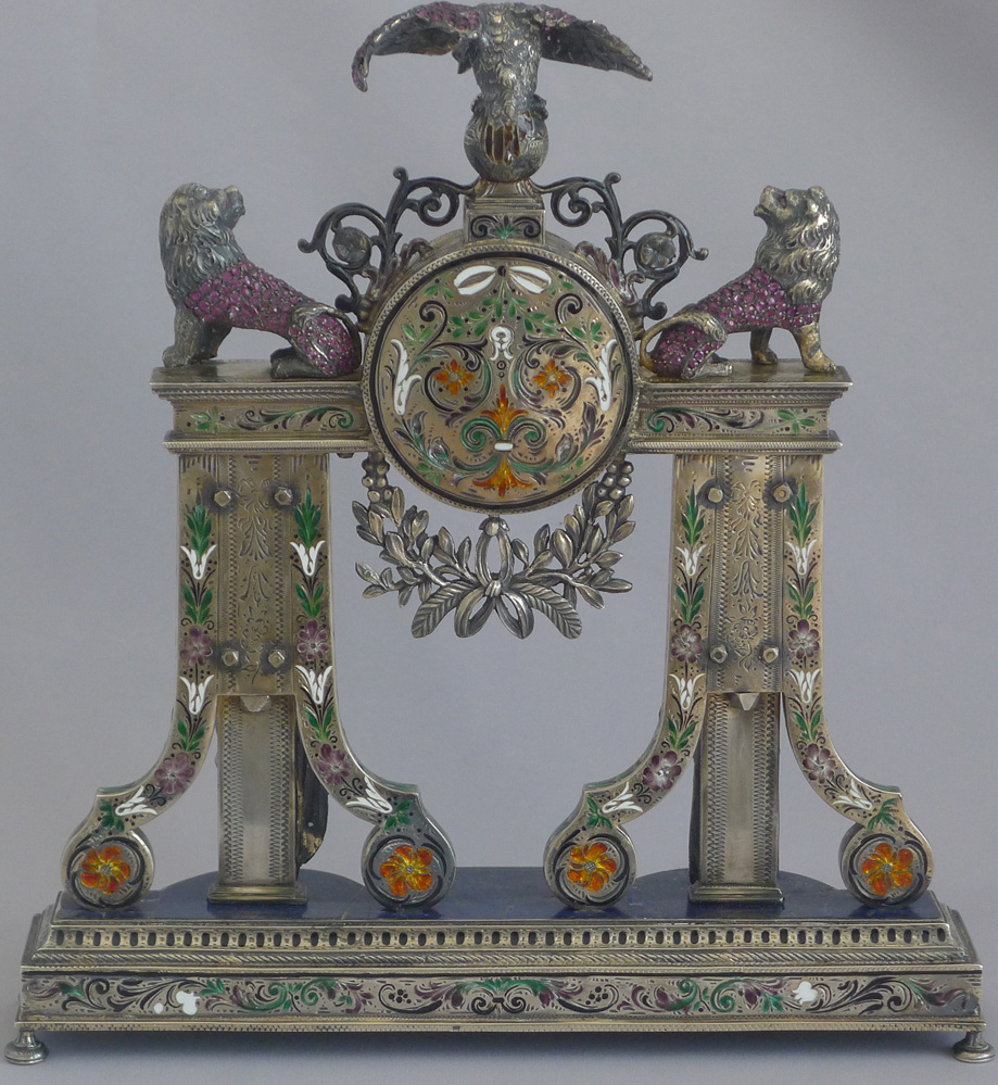 Spectacular antique Viennese silver gilt, enamel and jewelled clock modelled as a fire surround
