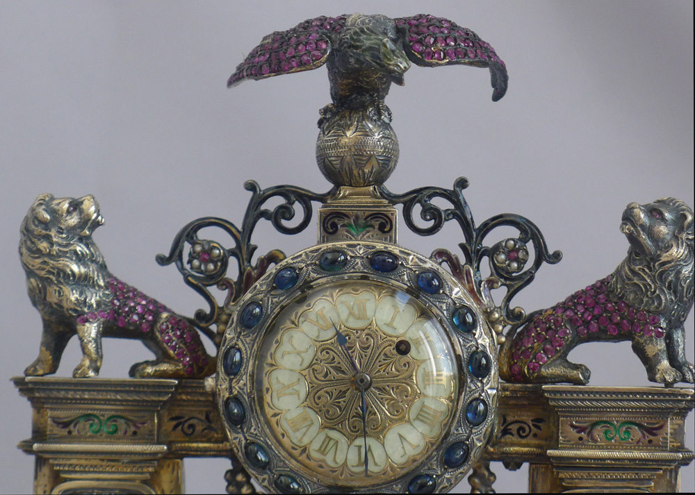 Spectacular antique Viennese silver gilt, enamel and jewelled clock modelled as a fire surround