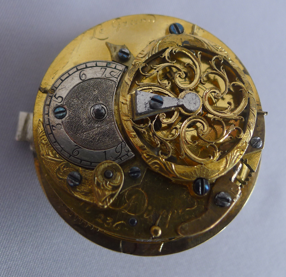 Spectacular antique Viennese silver gilt, enamel and jewelled clock modelled as a fire surround