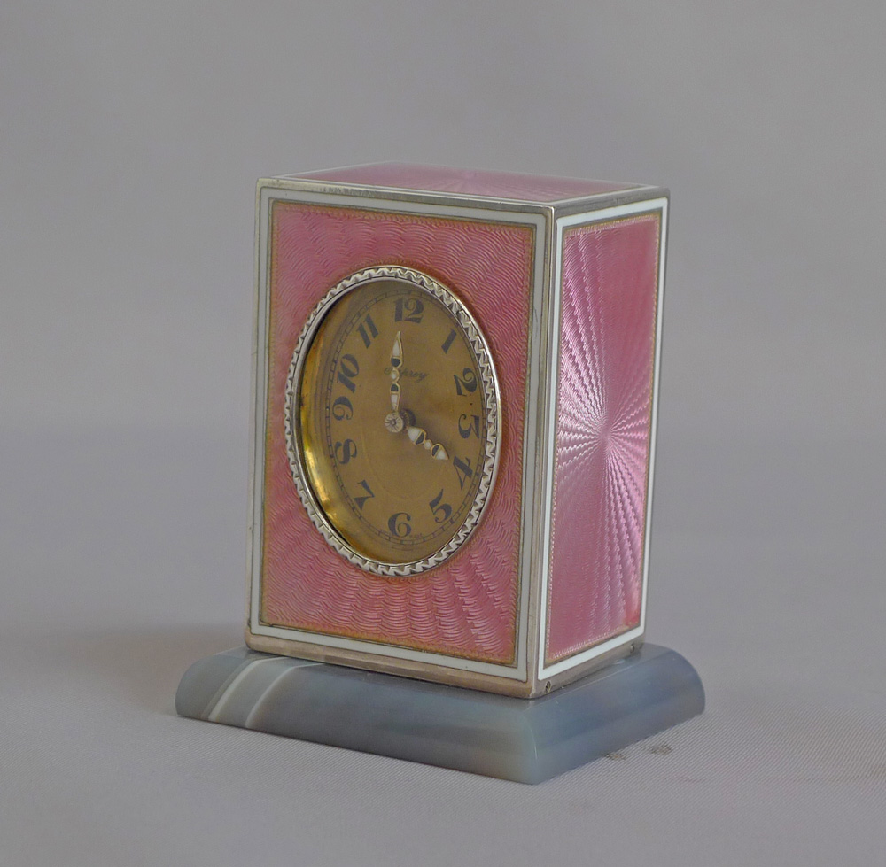 Fabulous pink guilloche enamel and silver sub-miniature carriage clock by Asprey