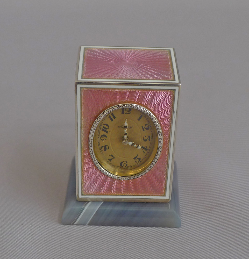 Fabulous pink guilloche enamel and silver sub-miniature carriage clock by Asprey