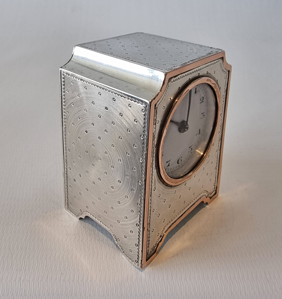 A Miniature Silver and Rose Gold Carriage or boudoir Clock by John Collard Vickery
