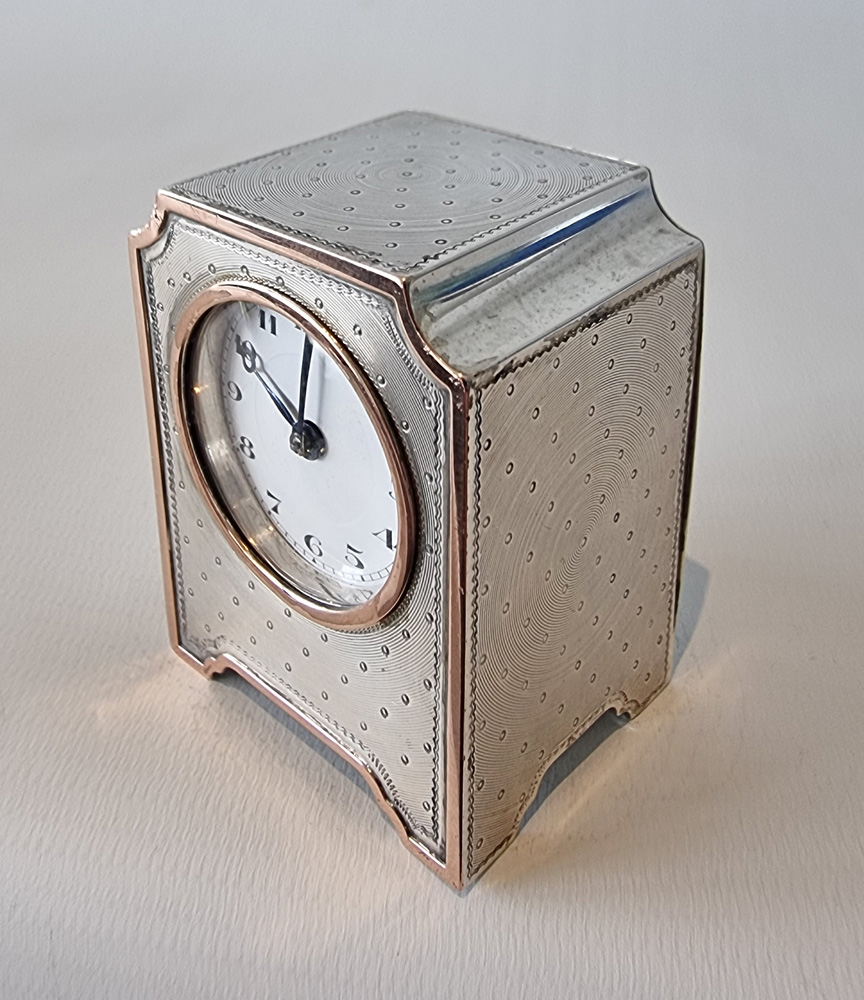 A Miniature Silver and Rose Gold Carriage or boudoir Clock by John Collard Vickery