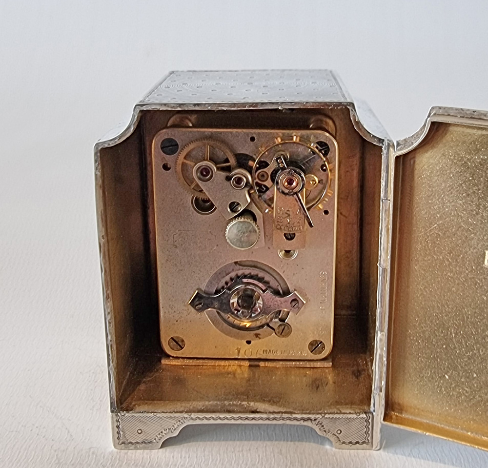 A Miniature Silver and Rose Gold Carriage or boudoir Clock by John Collard Vickery