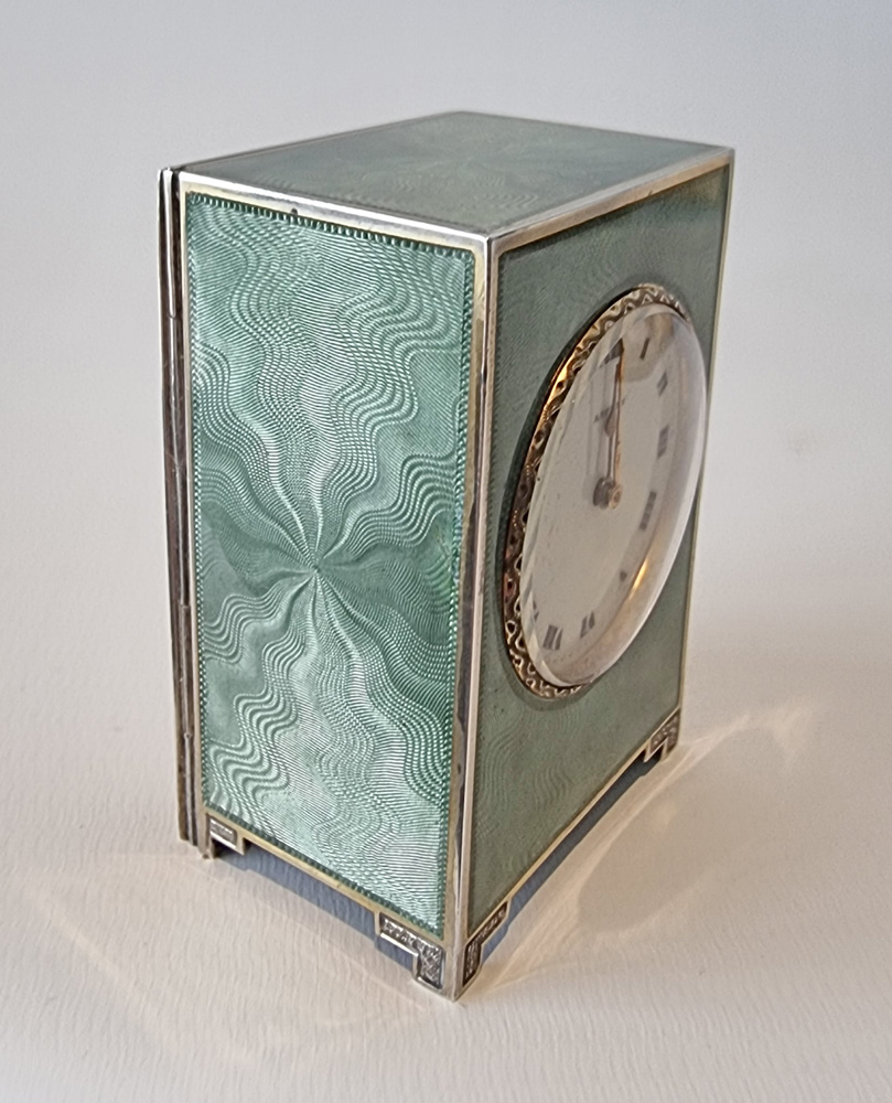 A fine Asprey Silver and Guilloche enamel miniature boudoir clock in original case